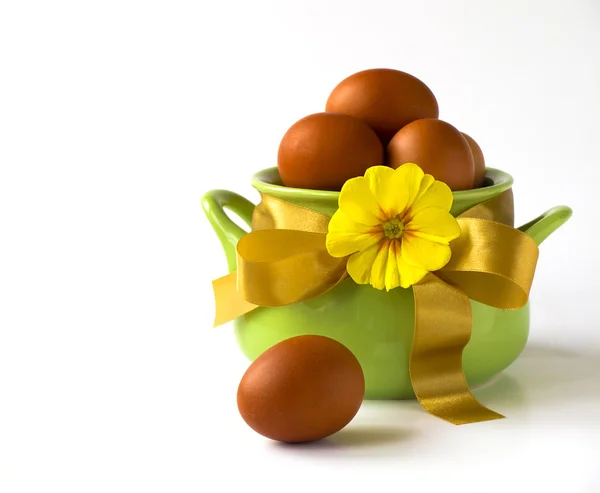 Easter greeting card - easter eggs in basket — Stock Photo, Image