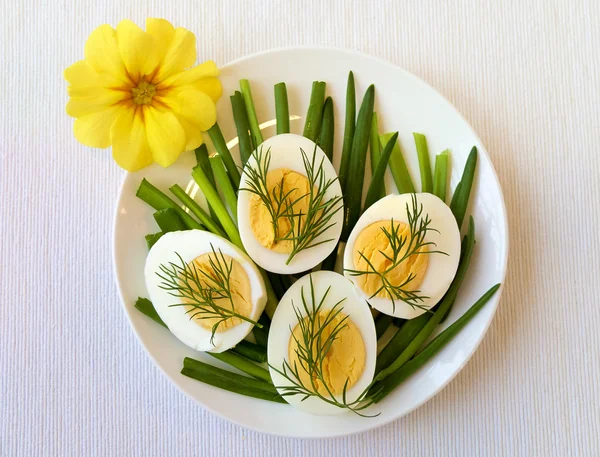 Easter healthy breakfast appetizer - eggs with dill and chive — Stock Photo, Image
