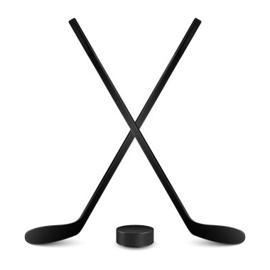 İki çapraz hokey sopaları ve puck. Beyaz izole