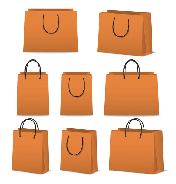 Blanco papier shopping tassen set geïsoleerd op wit — Stockvector