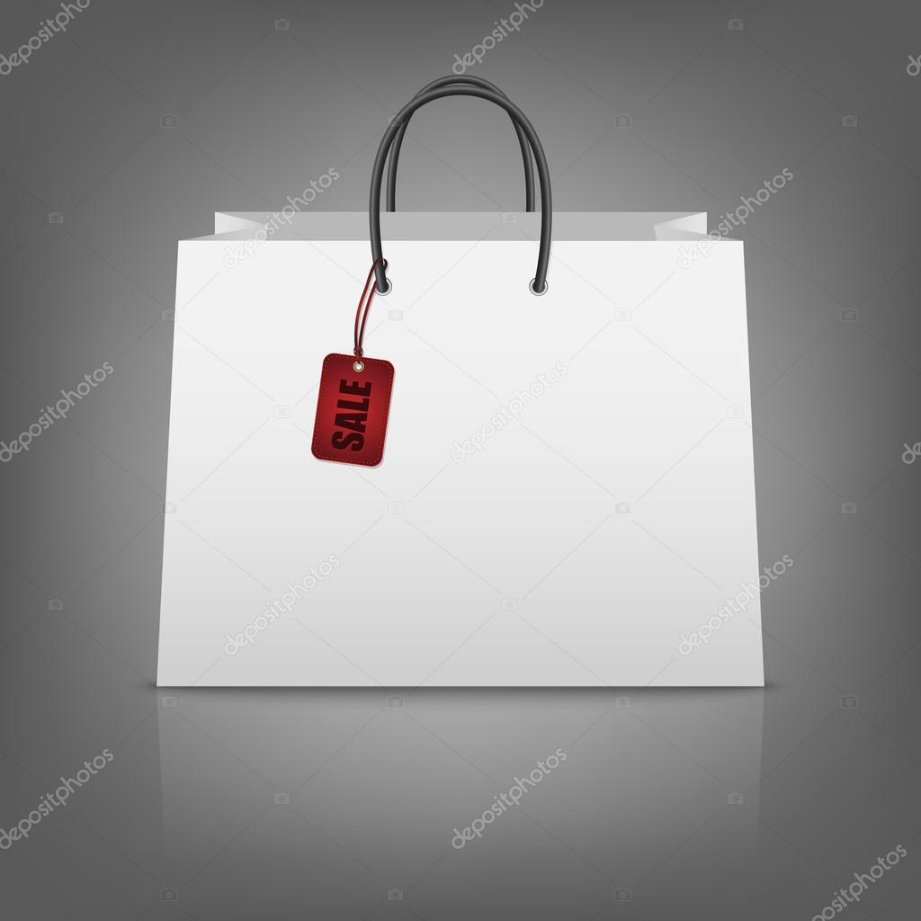 Blank paper shopping bags with sale tag.