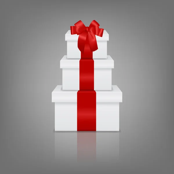 Empilement de trois boîtes-cadeaux blanches réalistes avec ruban rouge et arc — Image vectorielle