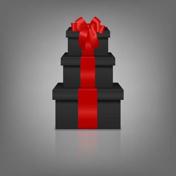 Stapel von drei realistischen schwarzen Geschenkboxen mit roter Schleife und Schleife — Stockvektor