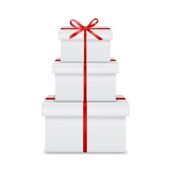 Stack of three realistic white gift boxes with red ribbon and bow — ストックベクタ