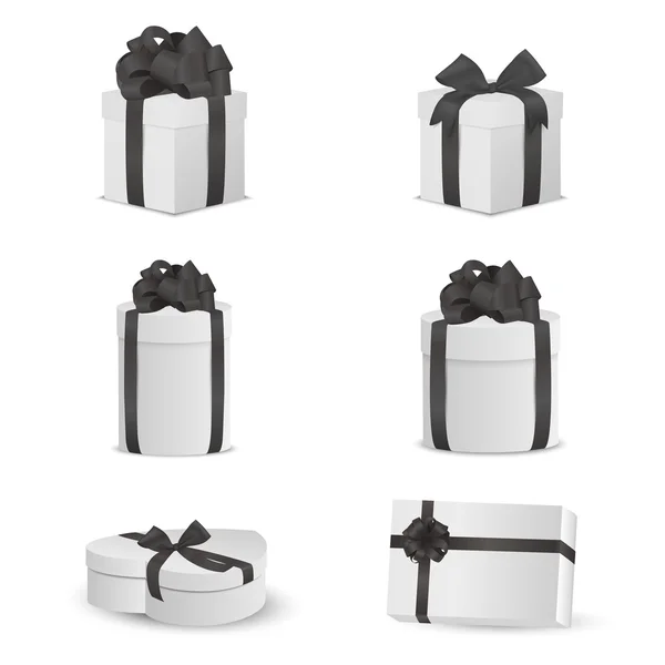 Set of white gift boxes with black bows and ribbons. — Stock Vector