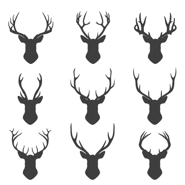 Set of deer silhouettes — Stock Vector