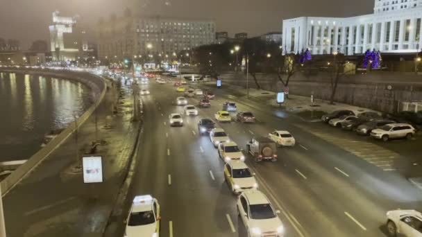 Moscow, Russia - January, 2021 night illuminated shot of Novoarbatsky Bridge and Hotel Ukraina in Moscow, Russia Night Moscow — Stock Video