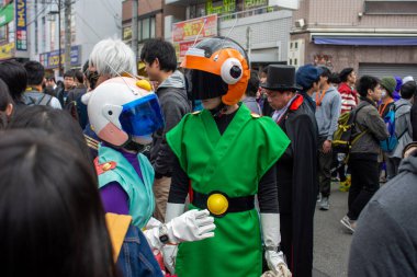 Osaka, Japonya - 18 Mart 2018: Nipponbashi Street Festa, her Mart ayında Osaka, Japonya 'da renkli kostüm ve anime festivali düzenlenir. Dünyanın en büyük kostüm etkinliklerinden biri.