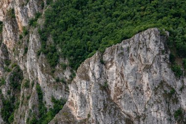 Steep rocky cliffs of Lazar's Canyon / Lazarev kanjon, the deepest and longest canyon in eastern Serbia, near the city of Bor clipart