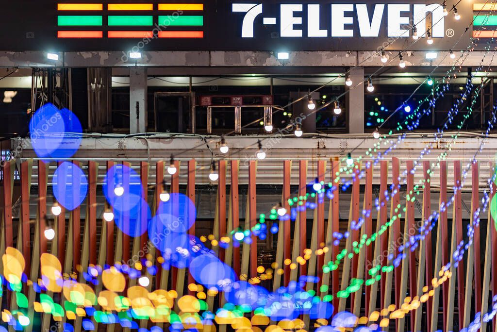 Night view of a 7-Eleven store with colorful string lights in Hangang river park in Seoul, South Korea on 25 October 2023