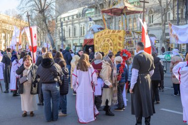 7 Ocak 2026 'da Gürcistan' ın başkenti Tiflis 'te geleneksel Alilo Ortodoks Noel alayı ve yardım gecesine katılanlar
