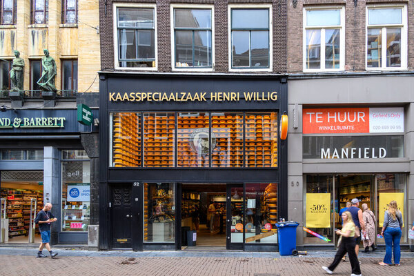 Cheese store with various cheeses on display in Amsterdam, Netherlands on 21 July 2025