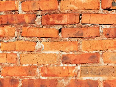 Tuğla duvar, yıpranmış, aşınmış duvar boya hasar görmüş. Grunge beton yüzey. Büyük arka plan veya doku.