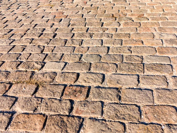 Urban stone paving stones. Texture, background, selective focus — Stock Photo, Image