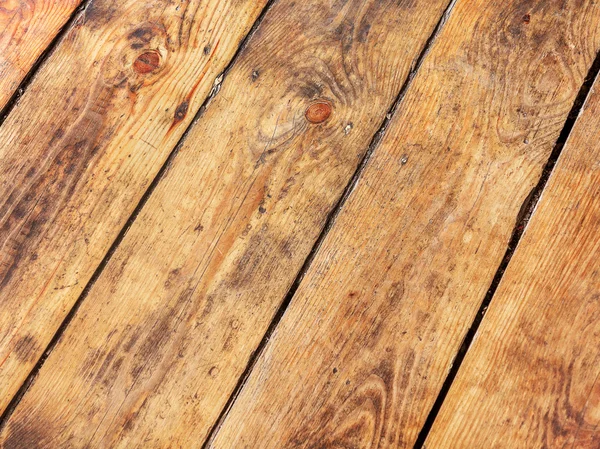 Old wooden planks cracked by a rustic background, selective focu — Stock Photo, Image