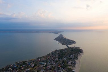 Early autumn dawn. Top view, aerial view, drone, quadcopter. Delta of the Dniester, the junction of the Dniester estuary with the Black Sea, Bottleneck, Zatoka, Odessa, Ukraine. clipart