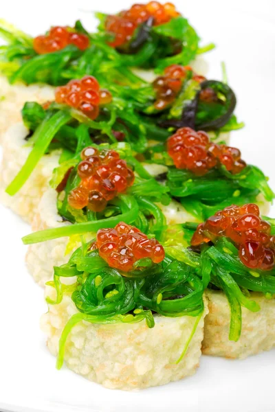 Maki Sushi with Salmon, red and black caviar. Selective focus — Stock Photo, Image