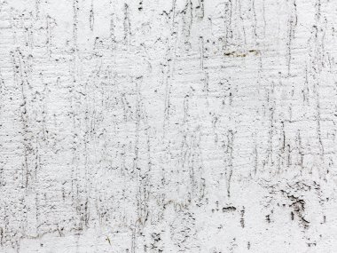 Beton, yıpranmış, yıpranmış, boyalı beyaz. Manzara tarzı. Grung