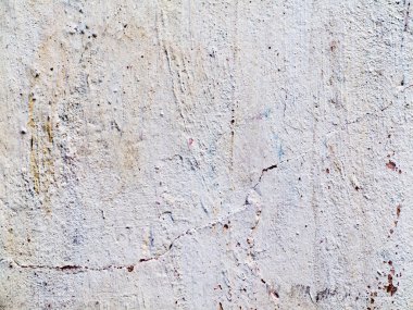 Beton, yıpranmış, yıpranmış, boyalı beyaz. Manzara tarzı. Grung