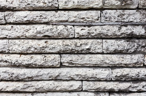 Muro costruito in pietra naturale. Può essere utilizzato come sfondo — Foto Stock