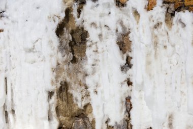 Taş duvar ile pas ve buz wint kaplı arka plan