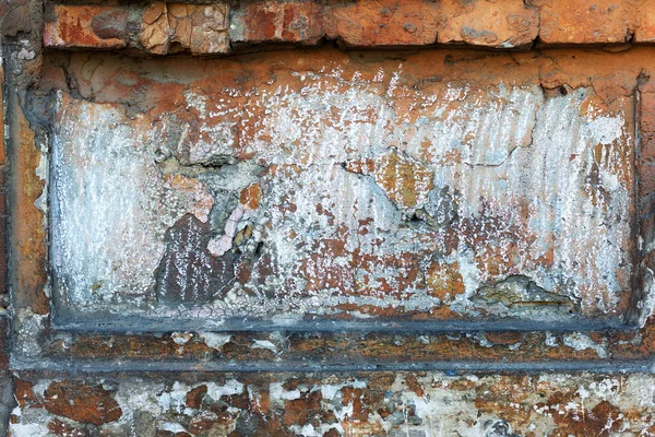 Vintage old damaged wall with cracks and scratches from a red br — Stock Photo, Image