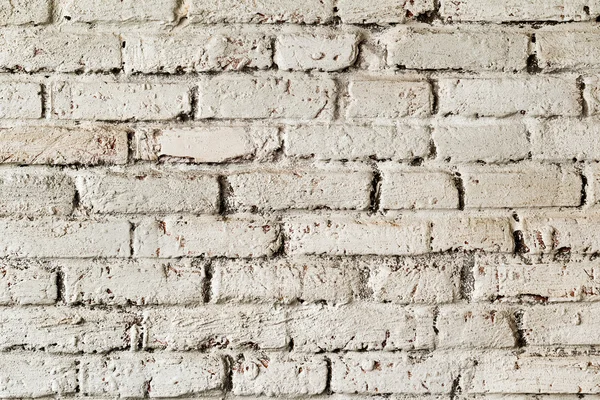 Fondo abstracto pared de ladrillo blanco viejo con grietas y arañazos —  Fotos de Stock