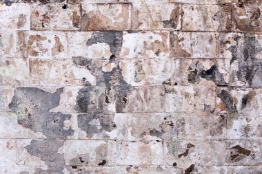 çatlak ve çizikler beyaz tuğla duvar eski arka plan. manzara tarzı. büyük arka plan veya doku.