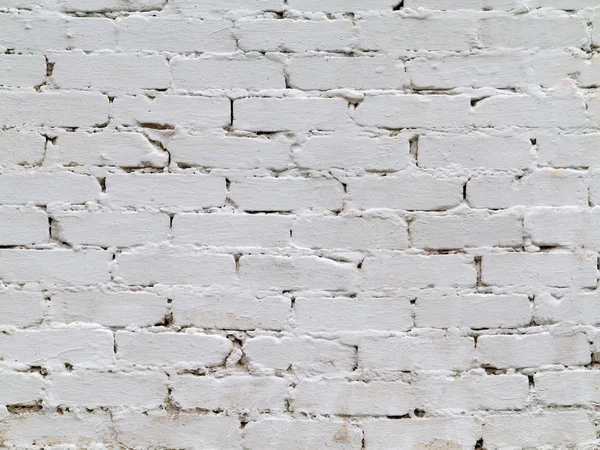 Fondo abstracto pared de ladrillo blanco viejo con grietas y arañazos —  Fotos de Stock