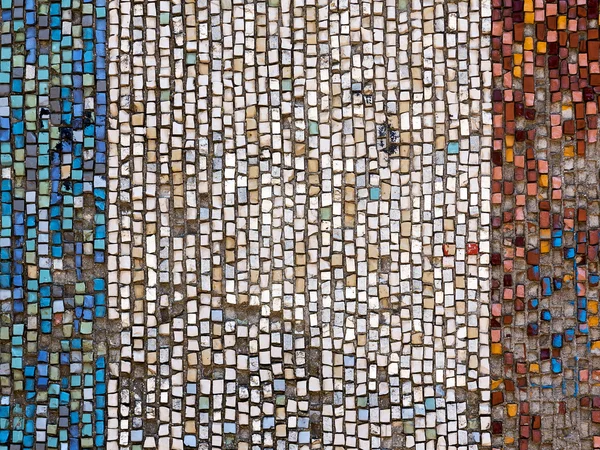 Old diagonal colorful mosaic texture on the wall. Landscape styl