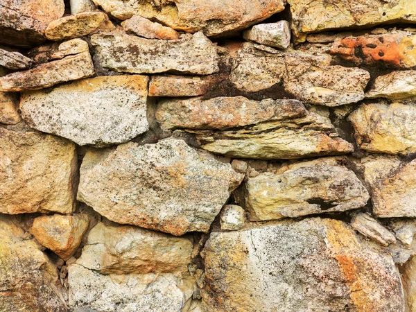 Abstract decorative wall of natural stone for any of your projec Royalty Free Stock Photos