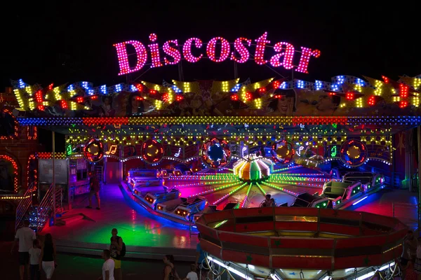 ODESSA, UKRAINE - JULY 12, 2015: colorful carousel with lights a — Stock Photo, Image