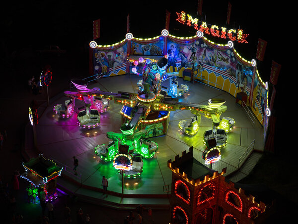 ODESSA, UKRAINE - JULY 12, 2015: colorful carousel with lights a