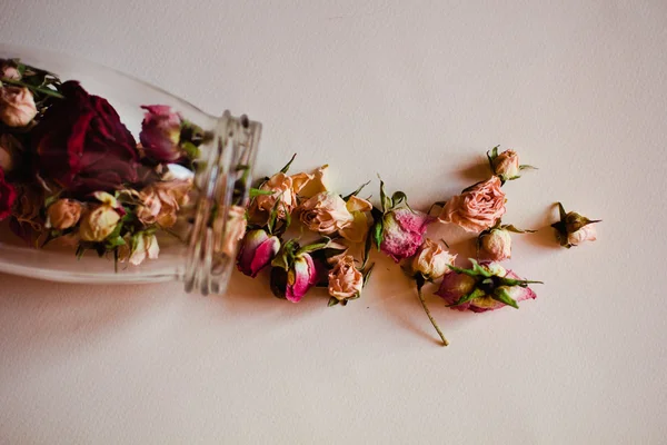 Open the jar of dried roses — Stock Photo, Image