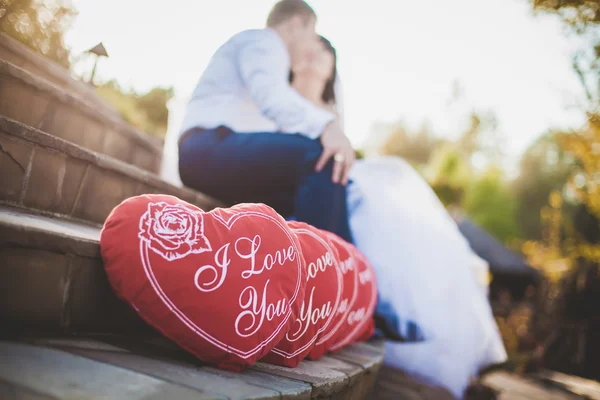 Bride and groom holding hands — Stock Photo, Image