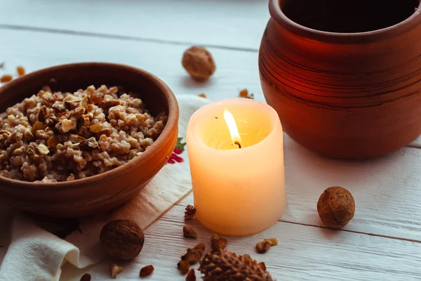 Christmas porridge with candle — Stock Image Christmas porridge with candle Stock Picture
