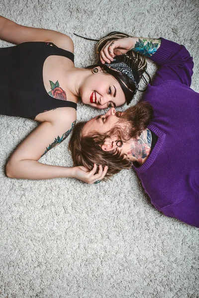 Beautiful young couple in love lyin — Stock Photo, Image