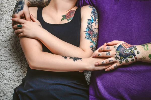 Beautiful young couple in love lyin — Stock Photo, Image