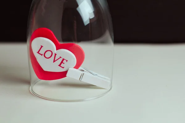 A beautiful heart with the inscription love in the glass. Original Valentine — Stock Photo, Image