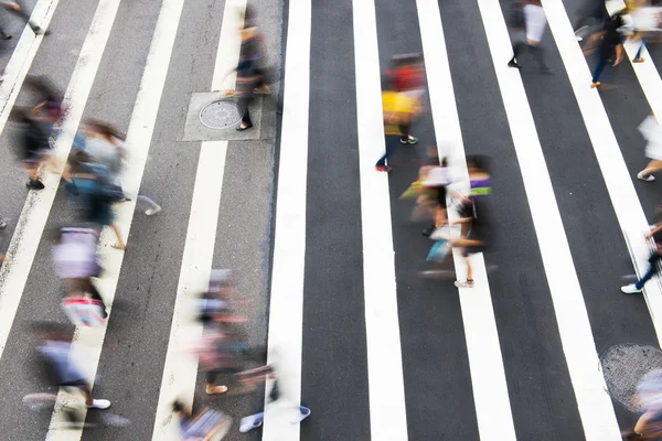 Busy city people on zebra crossing street