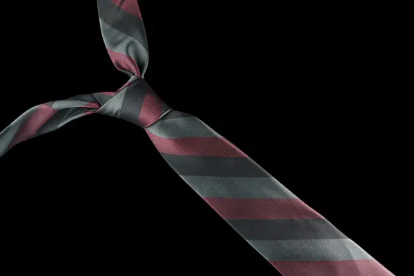 Шёлковый галстук в красных и зелёных полосах — стоковое фото