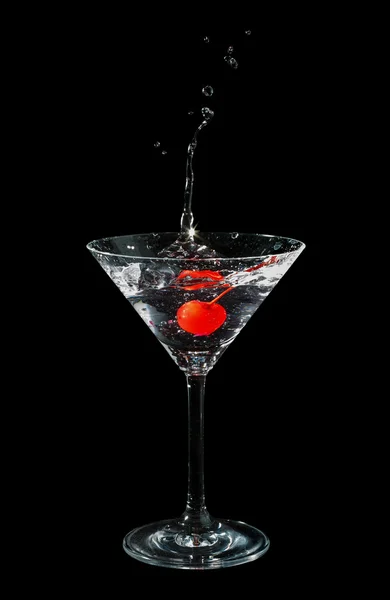 Maraschino cherry dropped in cocktail glass — Stock Photo, Image