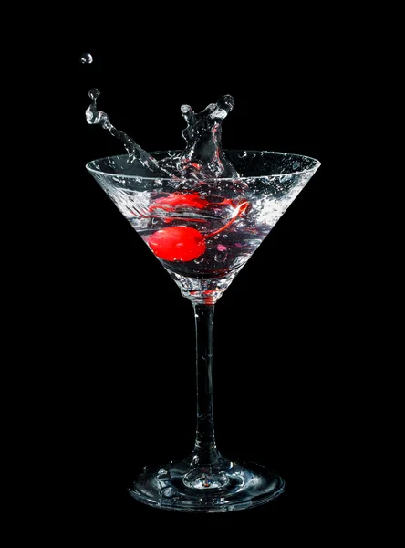 Maraschino cherry dropped in cocktail glass — Stock Photo, Image