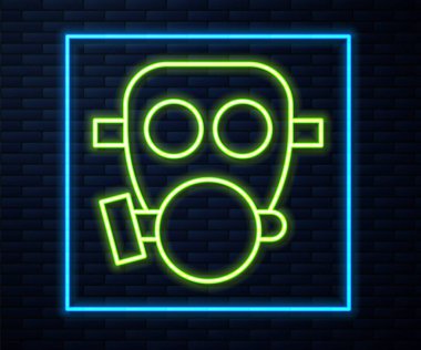Parlayan neon hattı gaz maskesi simgesi tuğla duvar arka planında izole edildi. Solunum cihazı işareti. Vektör.