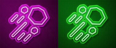 Parlayan neon hattı Uçan Taş simgesi mor ve yeşil arkaplanda izole edildi. Vektör.