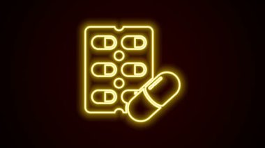 Parlayan neon çizgisi hapları siyah arka planda izole edilmiş. İlaç paketi. Tablet, vitamin, antibiyotik, aspirin. 4K Video hareketli grafik canlandırması