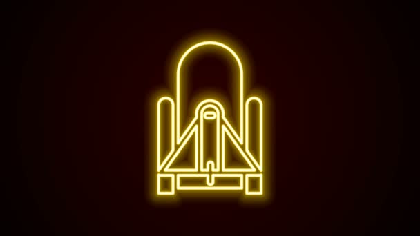 Ragyogó neon vonal Rocket dob az űrkikötő ikon elszigetelt fekete háttérrel. Rakéta kilövése az űrben. 4K Videó mozgás grafikus animáció — Stock videók