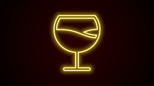 Linia strălucitoare de neon Pictograma de sticlă de vin izolată pe fundal negru. Semn Wineglass. 4K Animație grafică în mișcare video — Videoclip de stoc