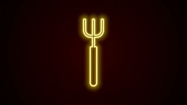 Parlayan neon hattı bahçe yabası simgesi siyah arkaplanda izole edildi. Bahçe çatalı işareti. Bahçecilik, tarım, çiftçilik aleti. 4K Video hareketli grafik canlandırması