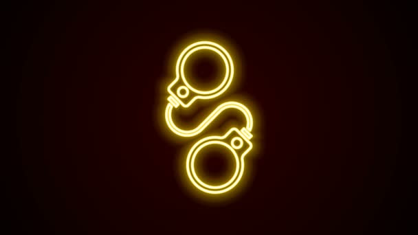 Glowing neon line Handcuffs icon isolated on black background. 4K Video motion graphic animation — Stock Video